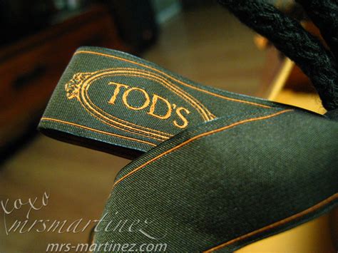 how to tell a fake tods bag|tods purse logo.